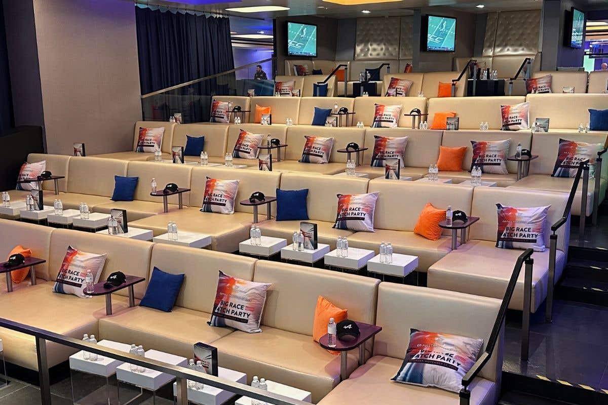 Tiered lounge seating setup for a race watch party event.