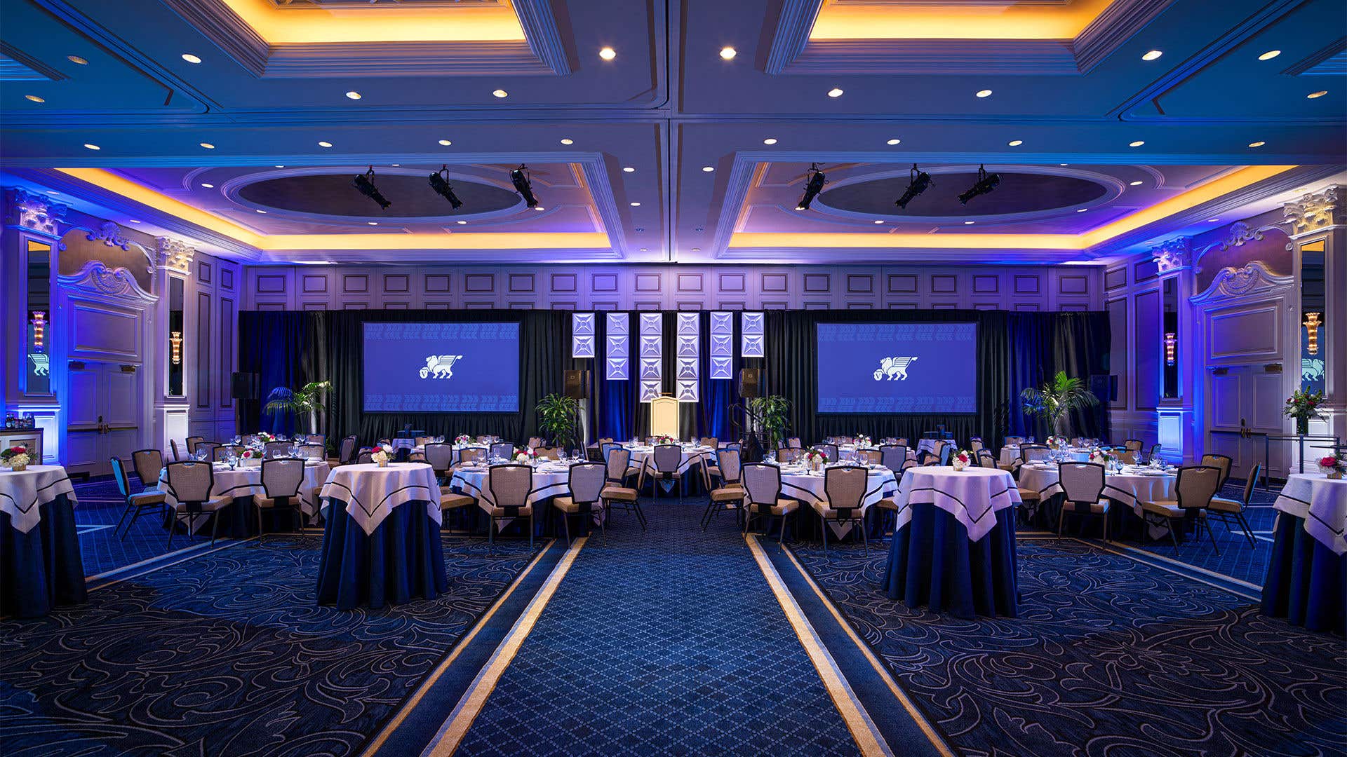 Palazzo Ballroom set with round tables for a dinner event 