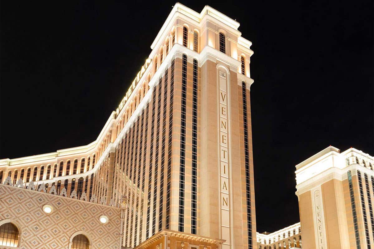 Exterior night view of the brightly lit Las Vegas hotel, The Venetian Resort.