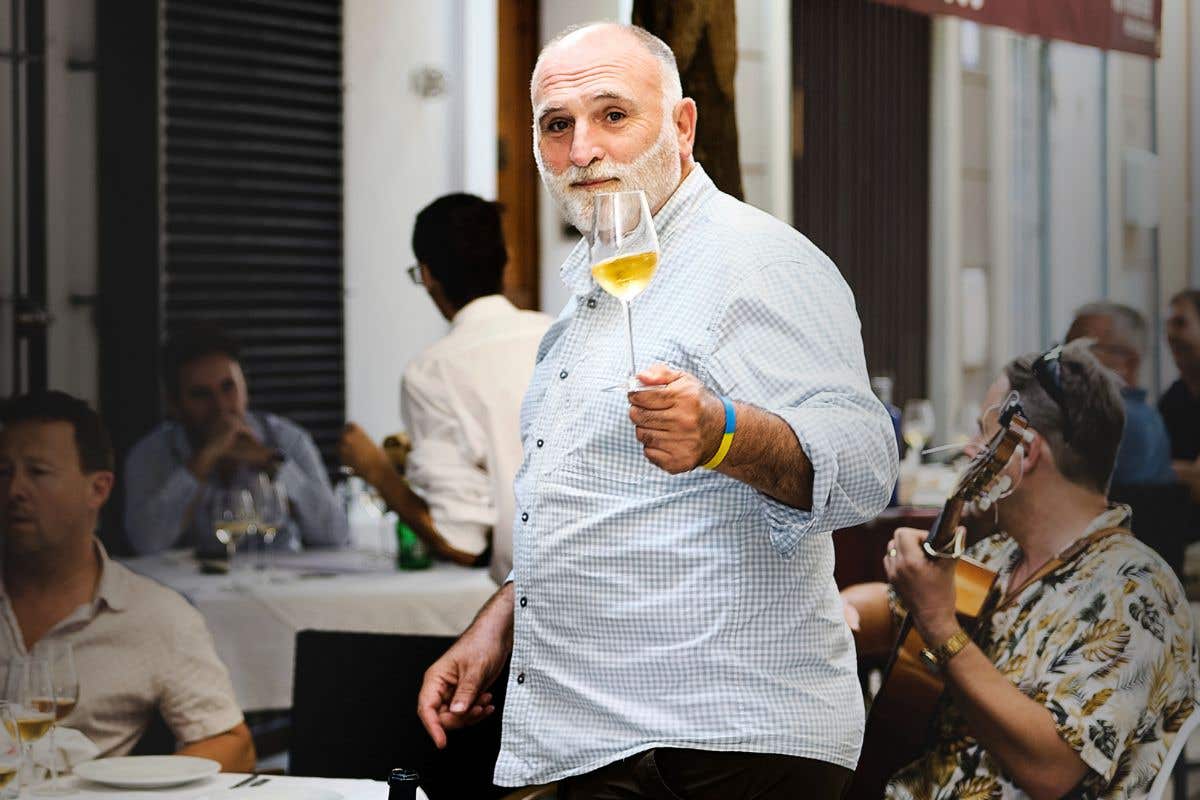 Promotional graphic for Spain My Way Live with José Andrés, showing José Andrés holding a wine glass at an outdoor Spanish restaurant.